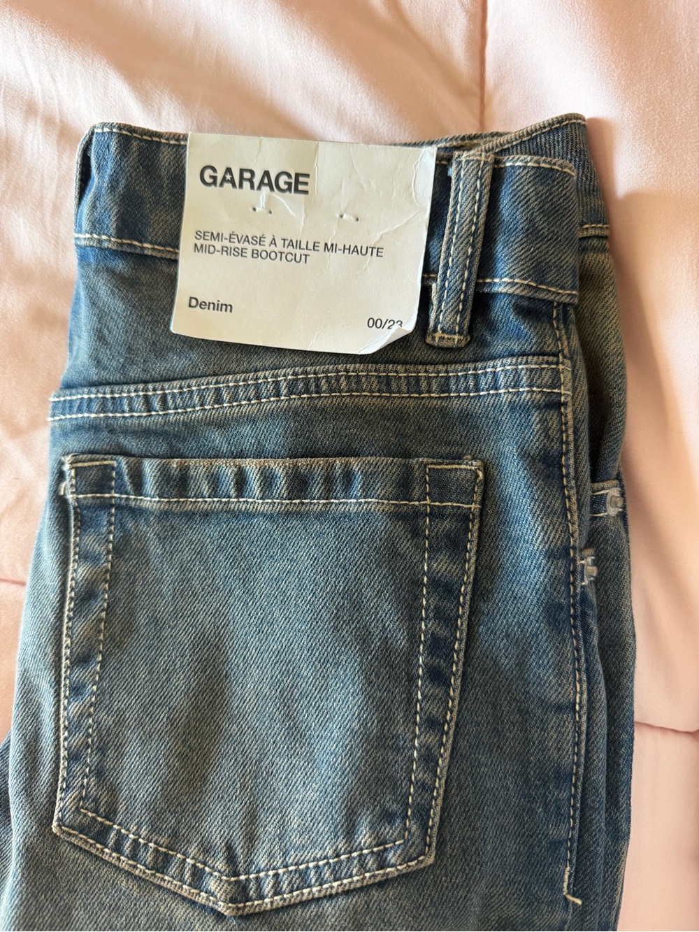 Garage Denim Jeans in Blue with Ivory Tag